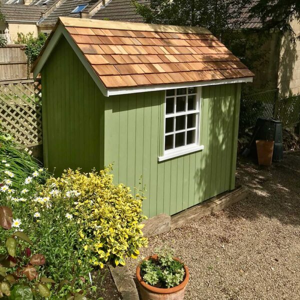Thorndown-Sedge-Green-Wood-Paint-on-Wood-and-Space-Shed-wall