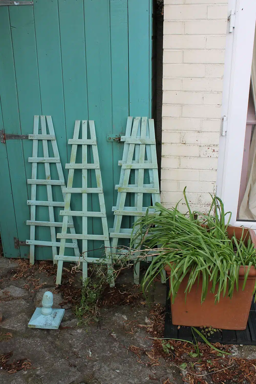 Green-obelisk-disassembled
