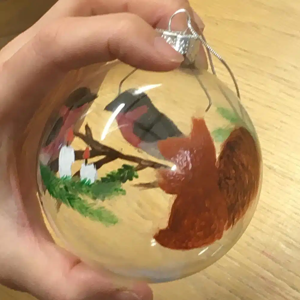 Painting-squirrel-on-glass-bauble-with-Thorndown-Peelable-Glass-Paint