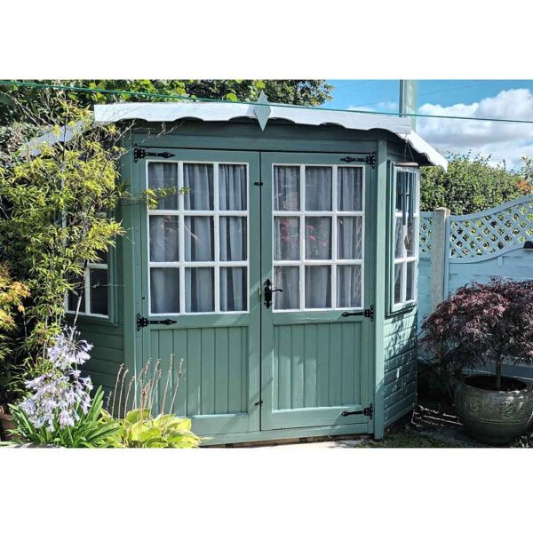 Thorndown-Bullrush-Green-Wood-Paint-with-Swan-White_Ian-Simpson-summerhouse