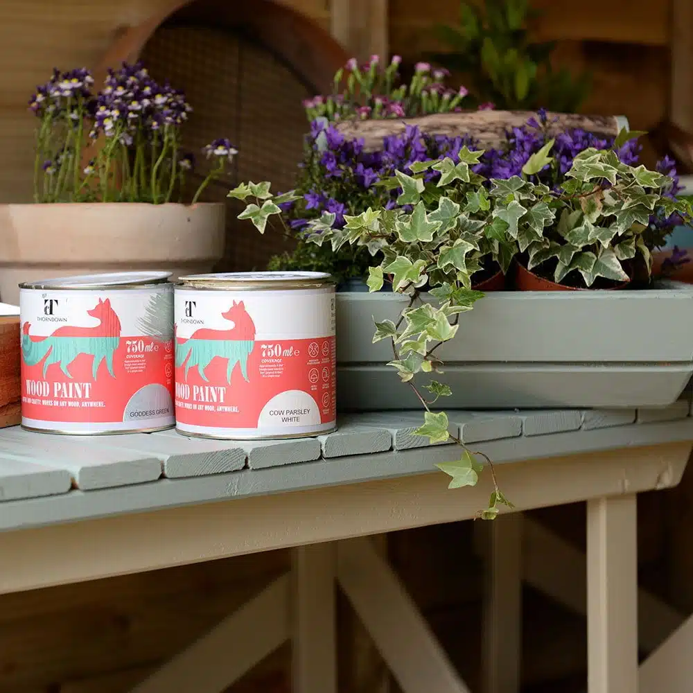 Thorndown-Goddess-Green-Wood-Paint-on-potting-bench-and-trug