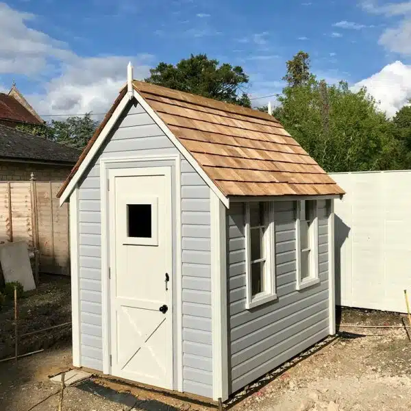 Thorndown-Zinc-Grey-and-Chantry-Cream-Wood-Paint-on-Wood-and-Space-Shed