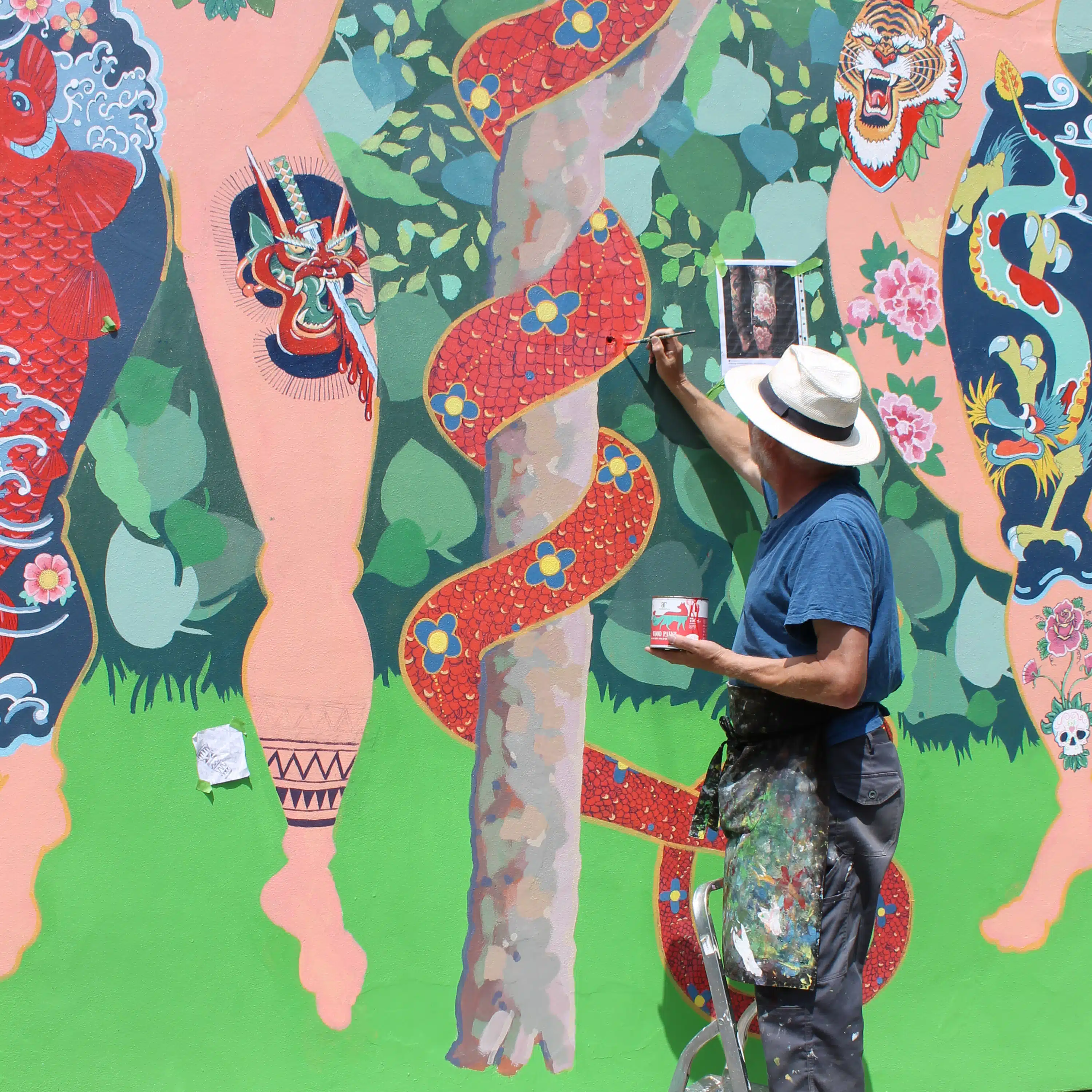 Frank Harwood painting mural with Thorndown Wood Paint