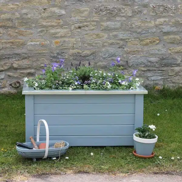 Thorndown-Axe-Blue-Wood-Paint-on-Forest-Cambridge-Planter_trug-and-terracotta-pot-with-Whey-White-rim_s