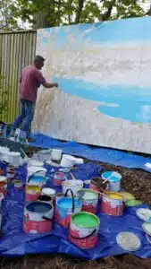 Jon-Minshull-painting-mural-background-with-Thorndown-Wood-Paint_Love-Your-Garden-Taunton2