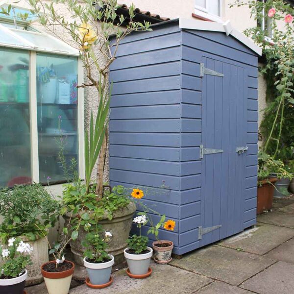 Thorndown-Hartlake-Blue-with-Whey-White-trim-Wood-Paint-on-shed