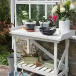 Thorndown-Whey-White-Wood-Paint-on-Forest-Potting-Bench-with-trugs-and-pots_sq