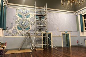 Faye-Suzannah-painting-mural_Glastonbury-Town-Hall_Thorndown-Wood-Paint