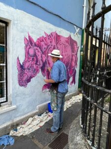 Frank-Harwood_painting-Pink-Rhino-mural_Thorndown-Wood-Paint