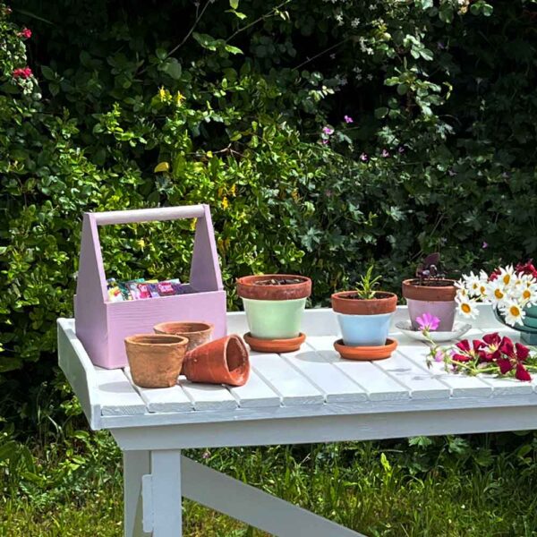 Thorndown-Egret-White-Wood-Paint-on-Forest-potting-bench_painted-plant-pots-and-trugs